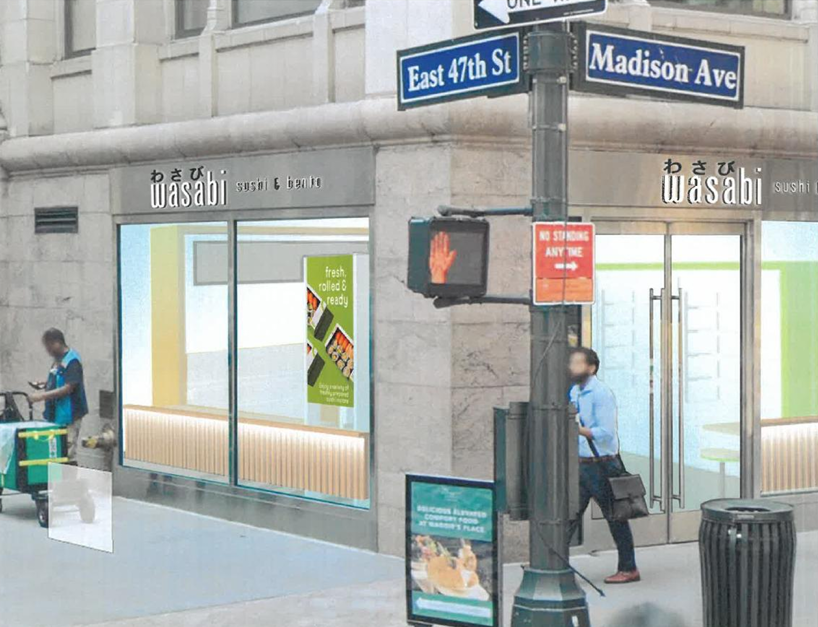 A street corner at East 47th St and Madison Ave features a Wasabi Sushi & Bento restaurant. Two people are on the sidewalk, one cleaning and one using a phone. There is a pedestrian signal showing a red hand.